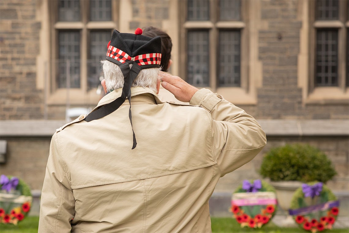 A veteran salutes at Rememberance Day
