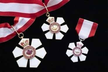 Order of Canada insignia on a black background