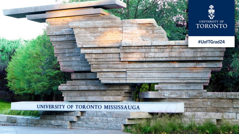 U of T Mississauga sign and rock structure, surrounded by green trees