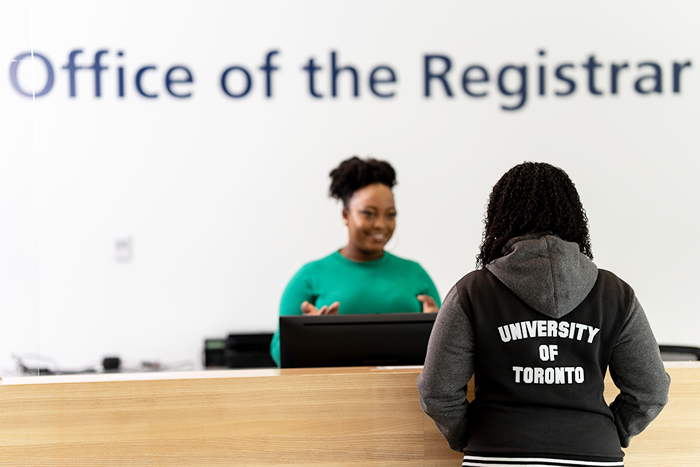 A student talks to someone at the Office of the Registrar