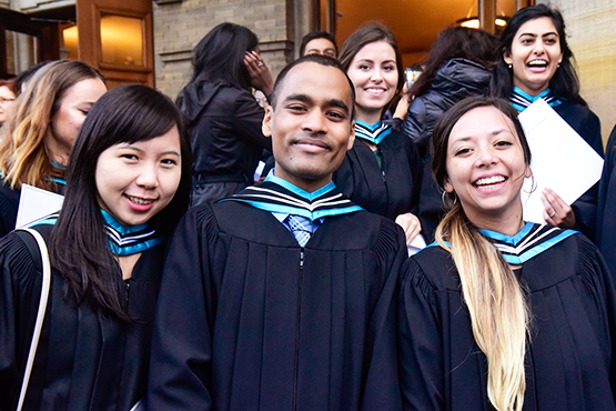 students celebrate outside Convocation Hall