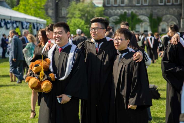 photo of UTM grads on front campus