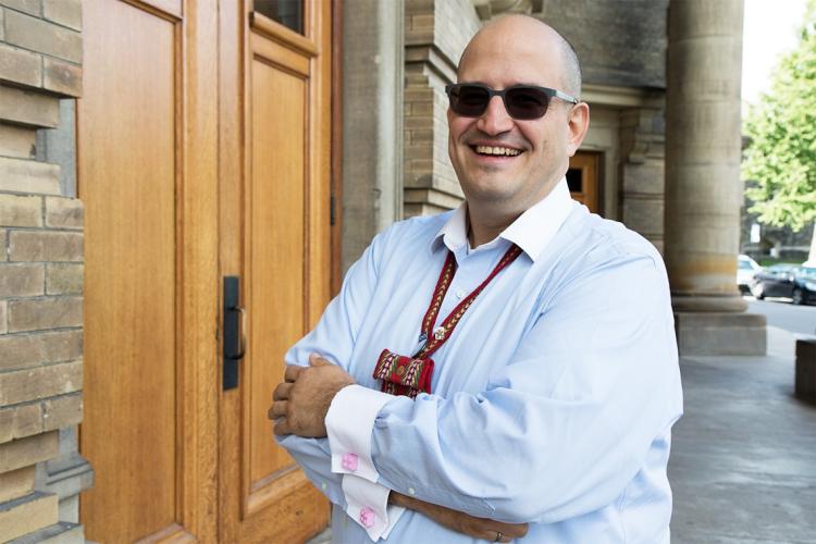 Jason Bazylak in front of Convocation Hall