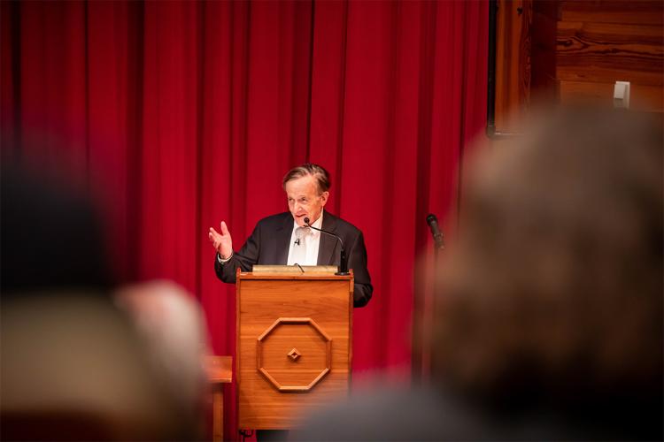 John Polanyi at the podium during the science for peace event