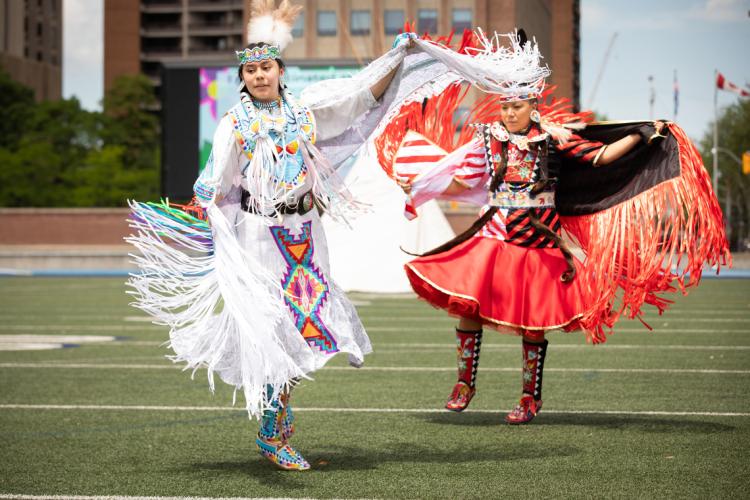 Alanna Pasche and Deanne Hupfield perform at an Indigenous vaccine clinic