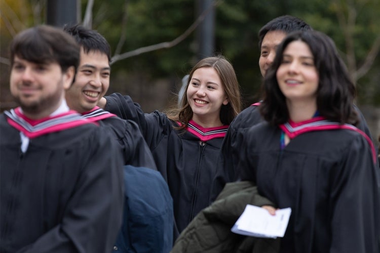 graduands line up outside convocation hall at the university of toronto