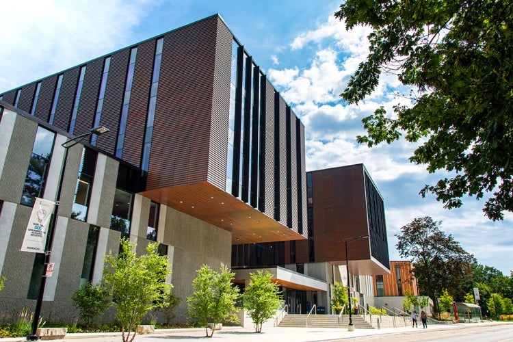 Exterior of Maanjiwe nendamowinan on a sunny summer day