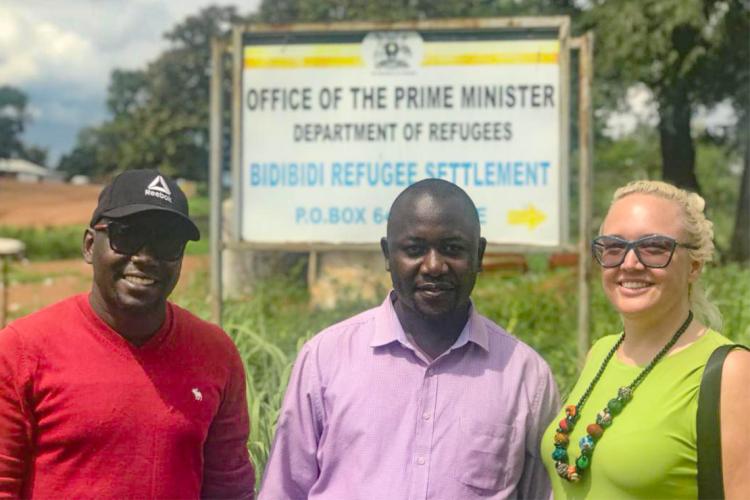 Photo of Carmen Logie, U of T PhD student Moses Okumu and Daniel Wakibi,