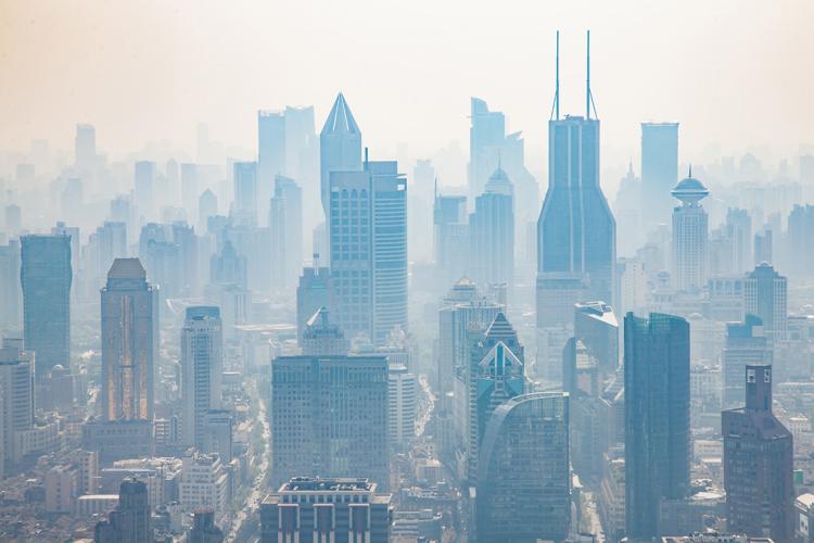 photo of smog with highrises in the background