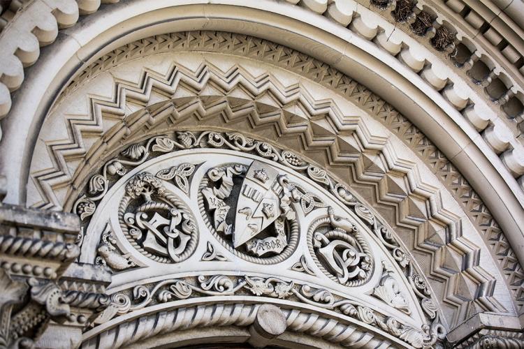 Photo of the stonework above the doors of University College