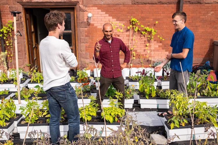 Nicolas Cote, Rashad Brugmann and Nathan Postma at the Trinity College rooftop garden