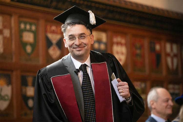 Markus Stock smiles after being installed at Hart House