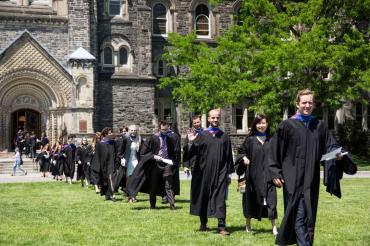 photo of medical school grads in procession