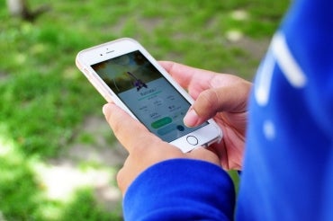 photo of phone in player's hands