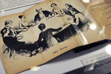 Photo from book showing seance