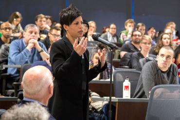 photo of audience members at town hall