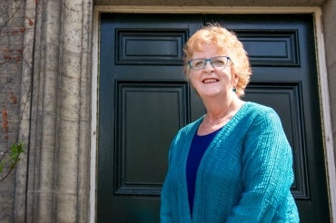 Portrait of Ellen Hodnett outside Simcoe Hall