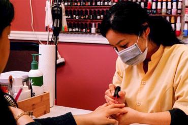 Nail technician Jackie Liang at work