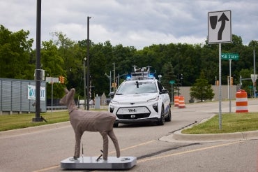 UofT's self driving car avoids a mock moose crossing the road