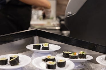 sushi plates being served at UTSC