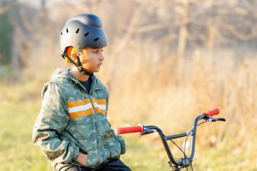 Child wearing new helmet for Sikh kids