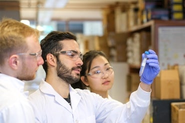 From left: PhD candidate Sean Kinney, alumni Alexander E. Vlahos and PhD student So-Yoon Won