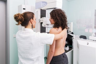 Woman receiving a mammogram