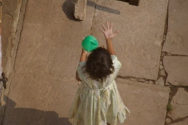 Girl playing with a ball photo