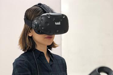 Researcher wearing a VR headset