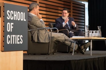 Photo of Richard Florida and Pittsburgh Mayor Bill Peduto on stage