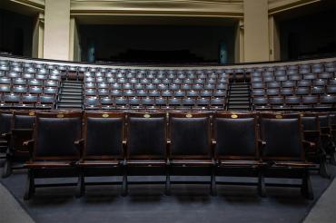 view of empty seats inside convocation hall at st. george campus, university of toronto