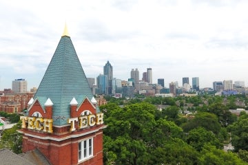 Tech tower in the foreground and the Atlanta skyline in the background