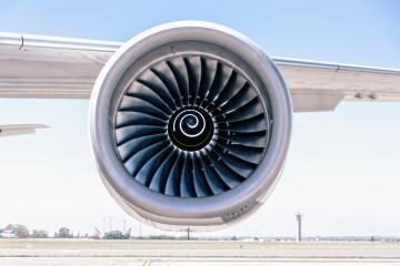 Sustainability plan to offset aircraft CO2 emissions: Close up of an airplane jet engine