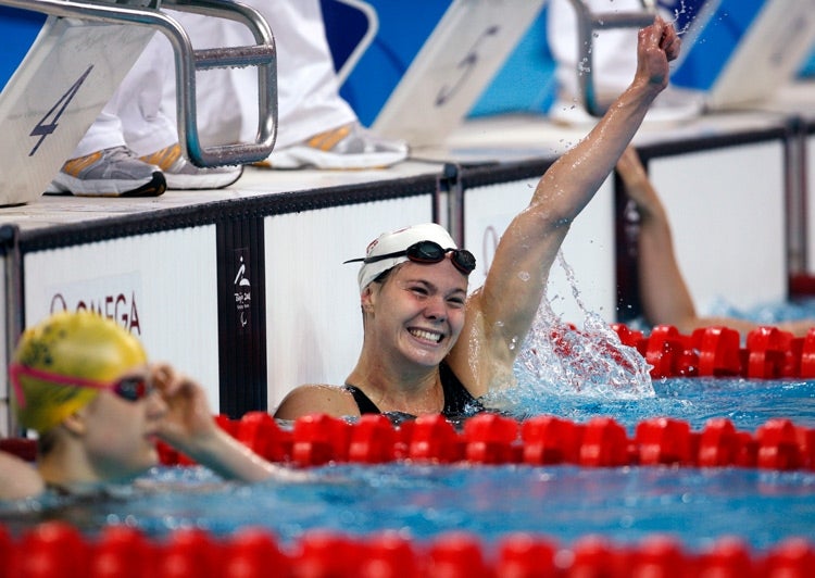 Stephanie Dixon pumps her fist in the air after winning gold at the 2008 Beijing paralympics