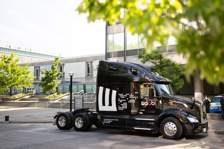 Waabi truck parked outside of Sidney Smith Hall